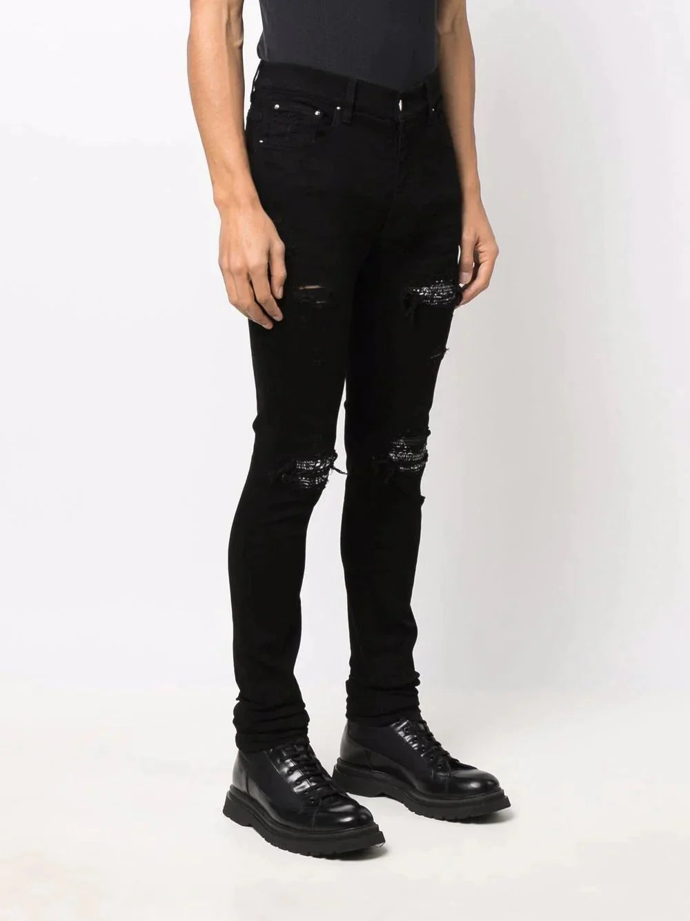 ripped detailing skinny jeans by amiri - bottegalusso: premier destination for modern luxury menswear