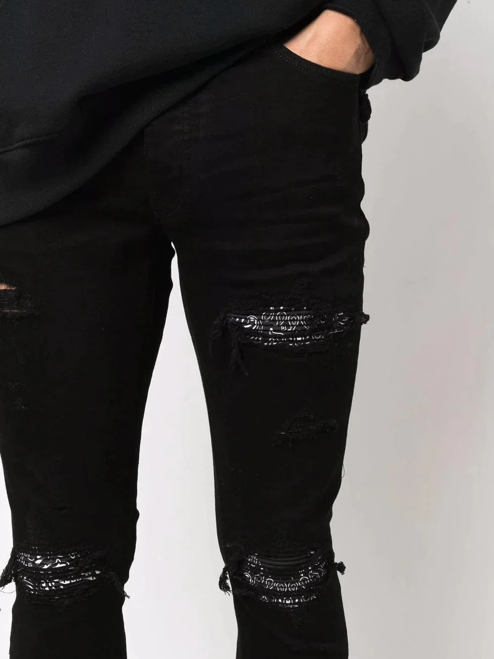 ripped detailing skinny jeans by amiri - bottegalusso: premier destination for modern luxury menswear