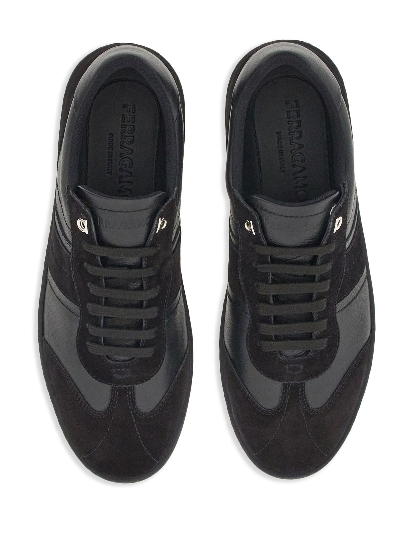 logo-debossed low top sneakers by ferragamo - bottegalusso: premier destination for modern luxury menswear