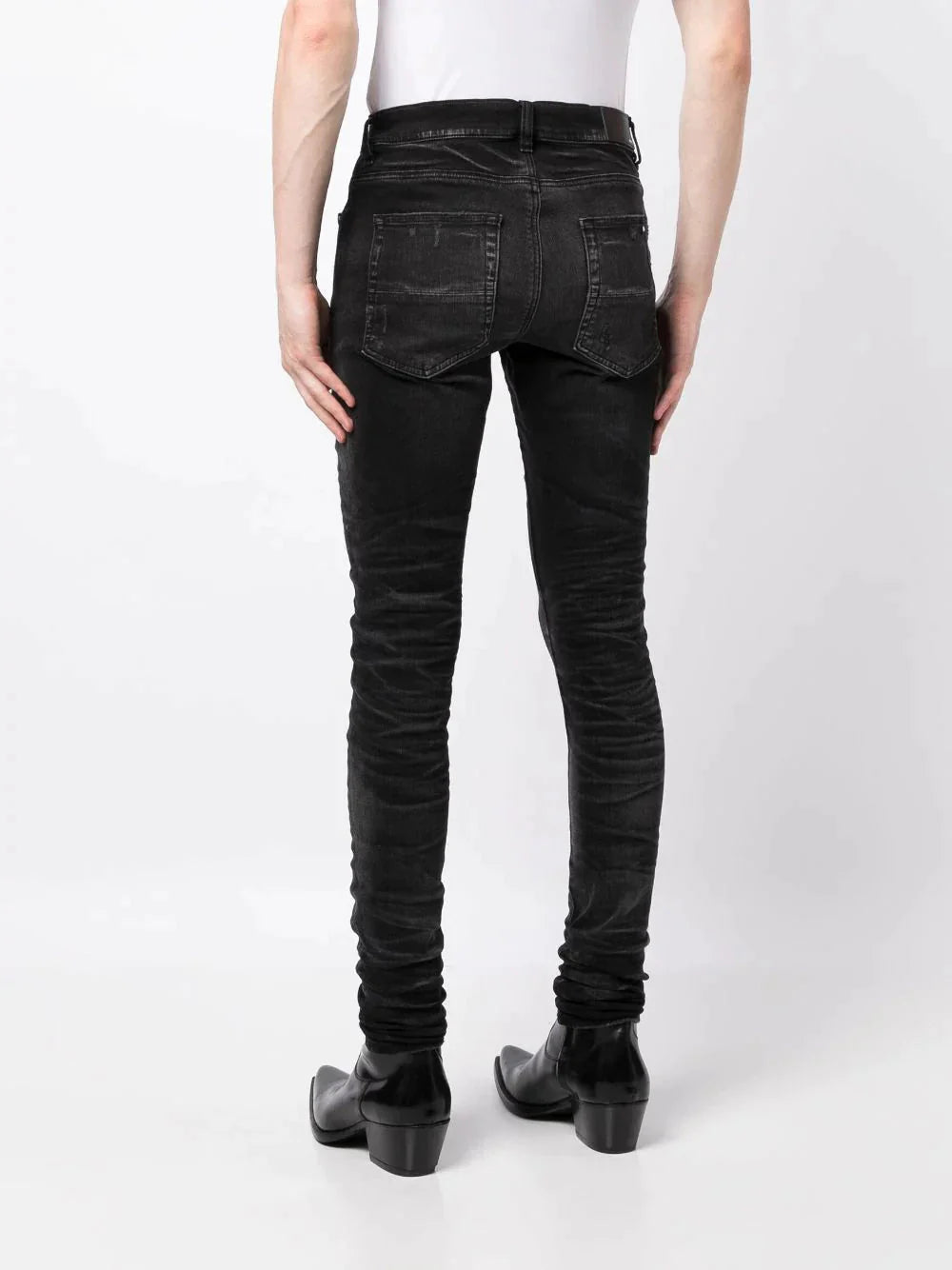 stack whiskered skinny jeans by amiri - bottegalusso: premier destination for modern luxury menswear