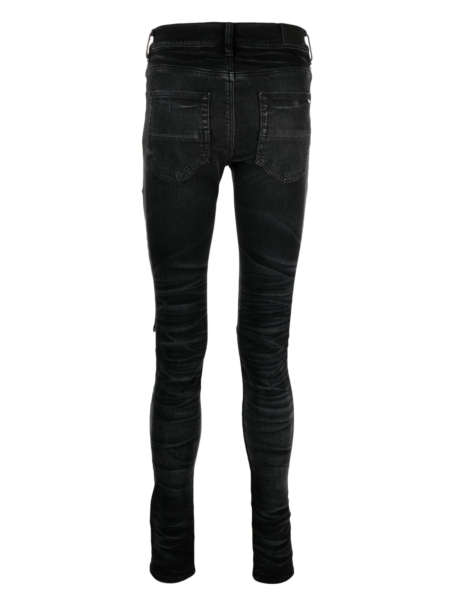 ripped detailing skinny jeans by amiri - bottegalusso: premier destination for modern luxury menswear