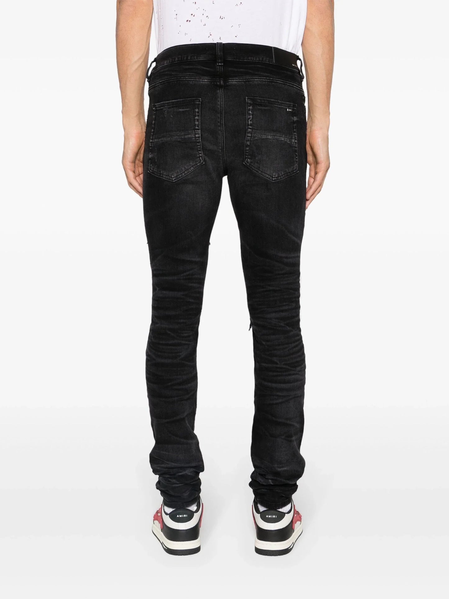 trasher ripped skinny jeans by amiri - bottegalusso: premier destination for modern luxury menswear