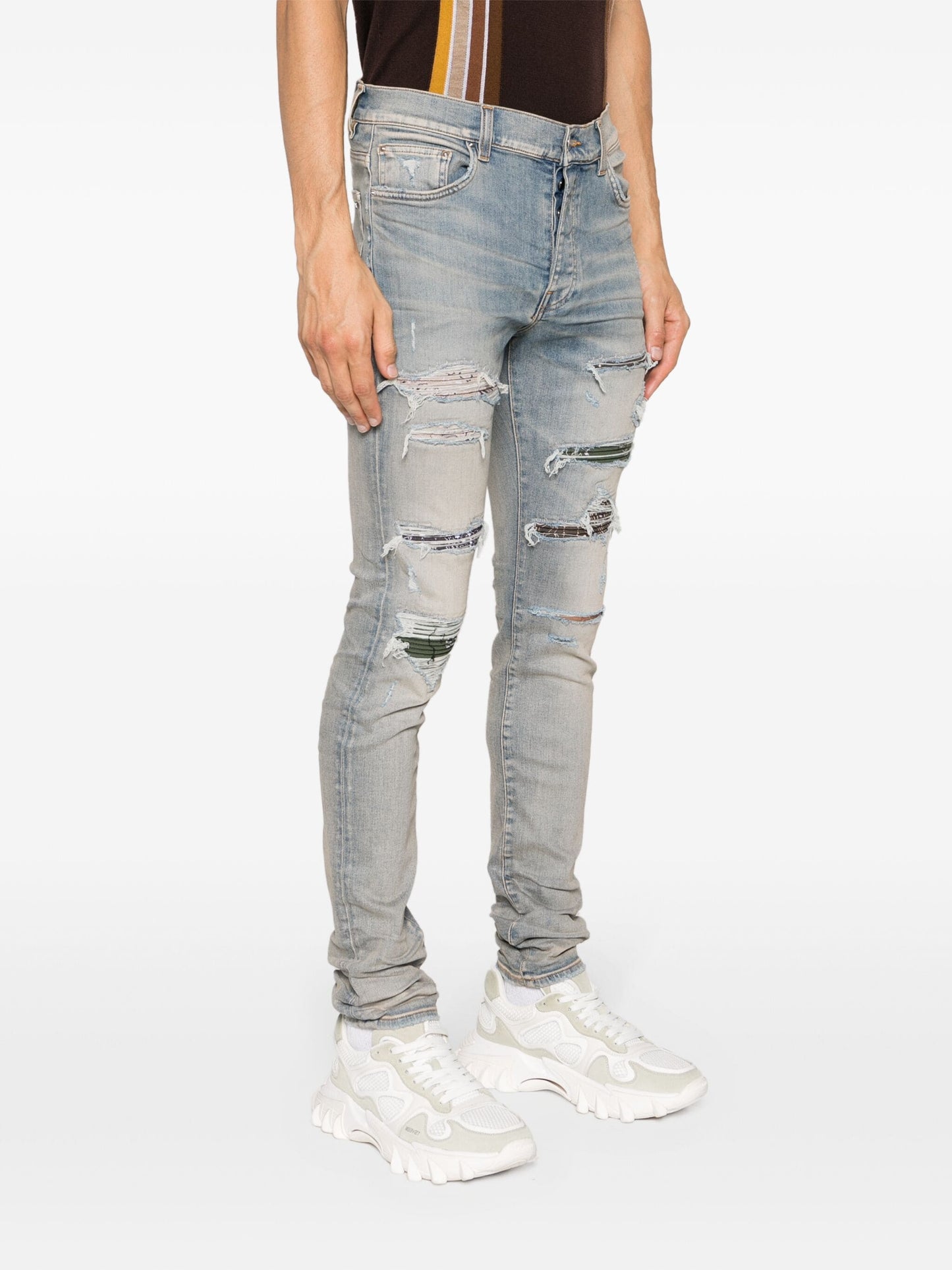 trasher ripped skinny jeans by amiri - bottegalusso: premier destination for modern luxury menswear