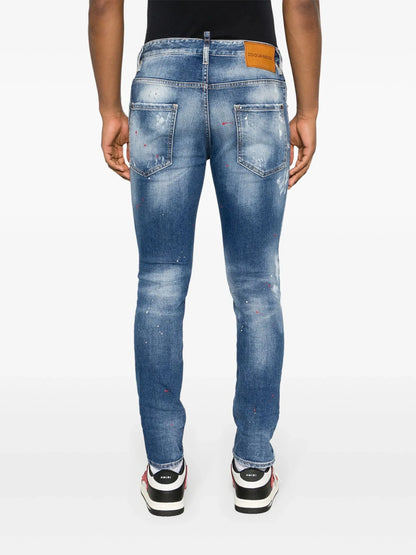 Paint Splatter Distressed Skinny Jeans by Dsquared2 - bottegalusso: Premier Destination for Modern Luxury Menswear